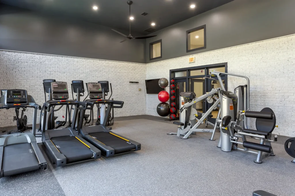 Fitness center with cardio and strength training machines