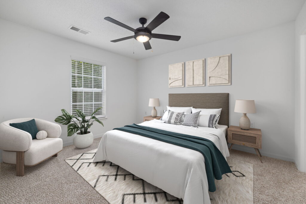 bedroom with private bath and window